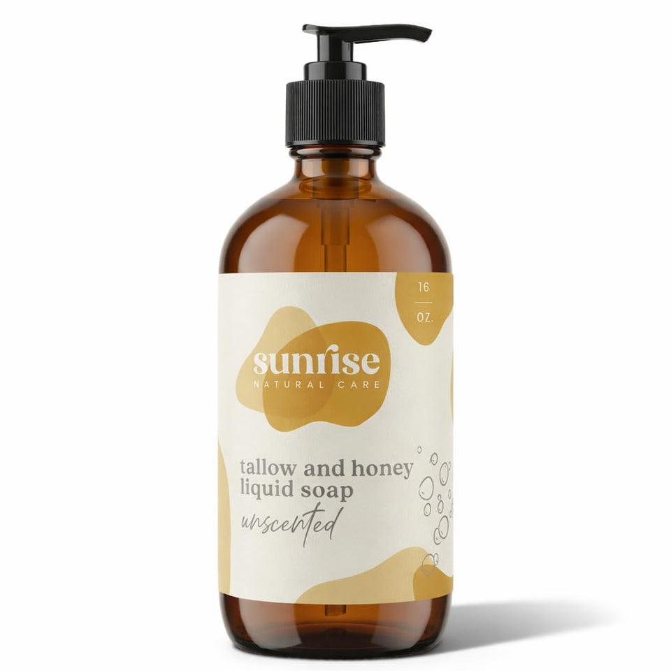 Sunrise Natural Care tallow and honey liquid soap bottle on a bathroom counter for daily cleansing.
