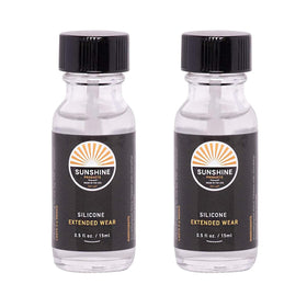 Sunshine Bond bottle close-up showing thin silicone adhesive for extended wear.