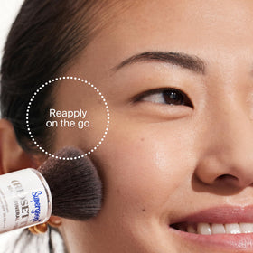 Supergoop! Coated silica spheres diffuse light for a soft-focus finish.