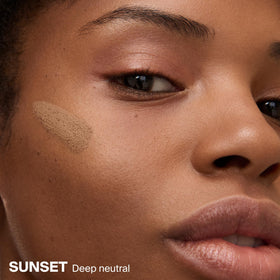 Close-up of MatteScreen pore-blurring, velvety matte finish on skin.
