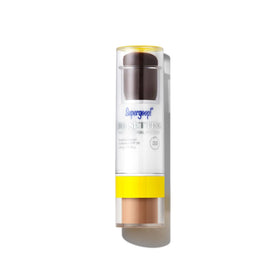 Supergoop! Resetting Powder bottle close-up for on-the-go SPF and makeup setting.
