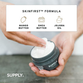 Supply plant-based cream bottle showing Aloe Vera, Jojoba Oil, Shea Butter for nourished skin