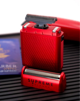 Supreme Trimmer Solo accessories include cleaning brush and protective cap for maintenance.