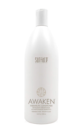 SURFACE Awaken conditioner bottle showcasing thickening formula for scalp care