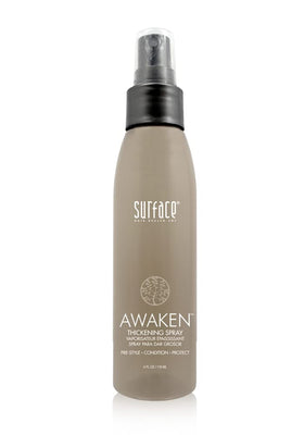 Surface Awaken Thickening Spray bottle for pre-style conditioning and heat protection.