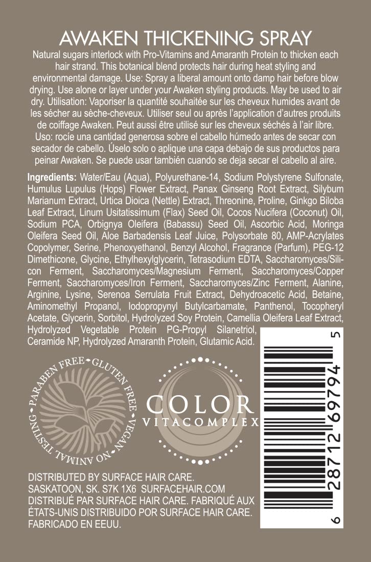 Surface Awaken Thickening Spray being dispensed on damp hair before blow-drying for volume.