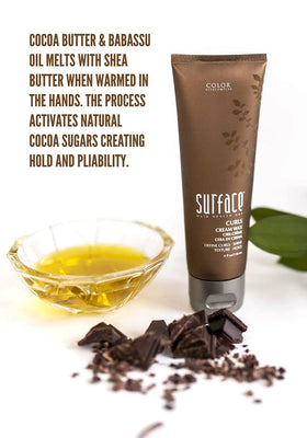 Bottle with Surface Curls Cream Wax highlights cocoa, shea, and babassu oils