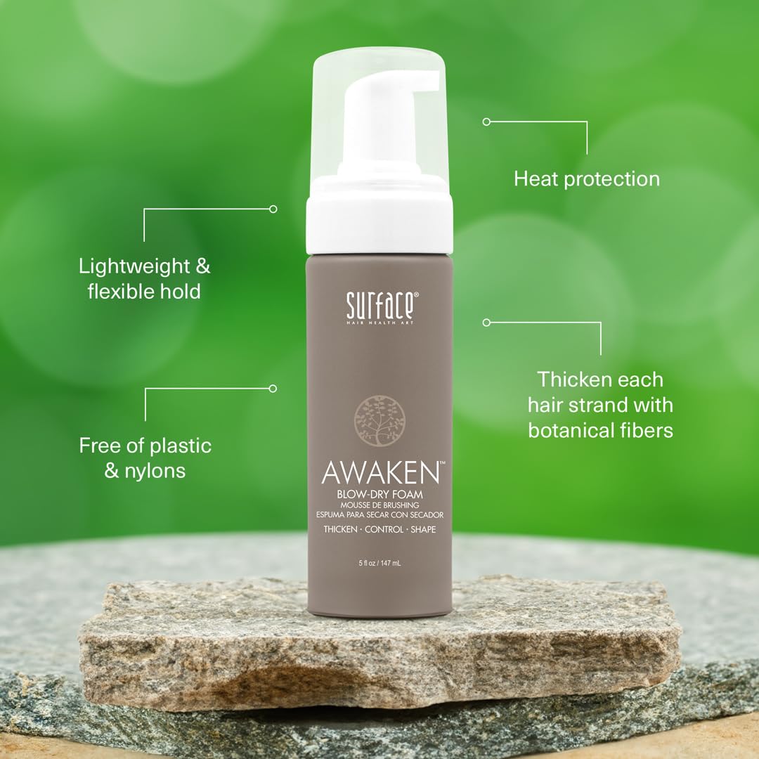 Hair strands visibly thickening as SURFACE Awaken foam is worked through