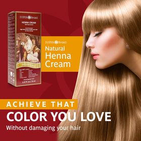 Applying Surya Brasil Henna Cream Swedish Blonde for smooth color application.