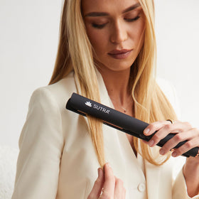 SUTRA IR2 flat iron with titanium-infused plates for a smooth glide