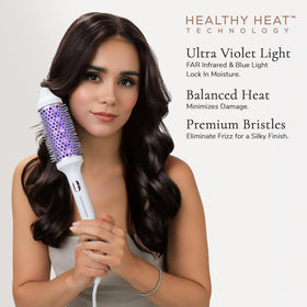 SUTRA Ultra Violet Thermal Brush ergonomic handle and dual voltage for travel scenarios.