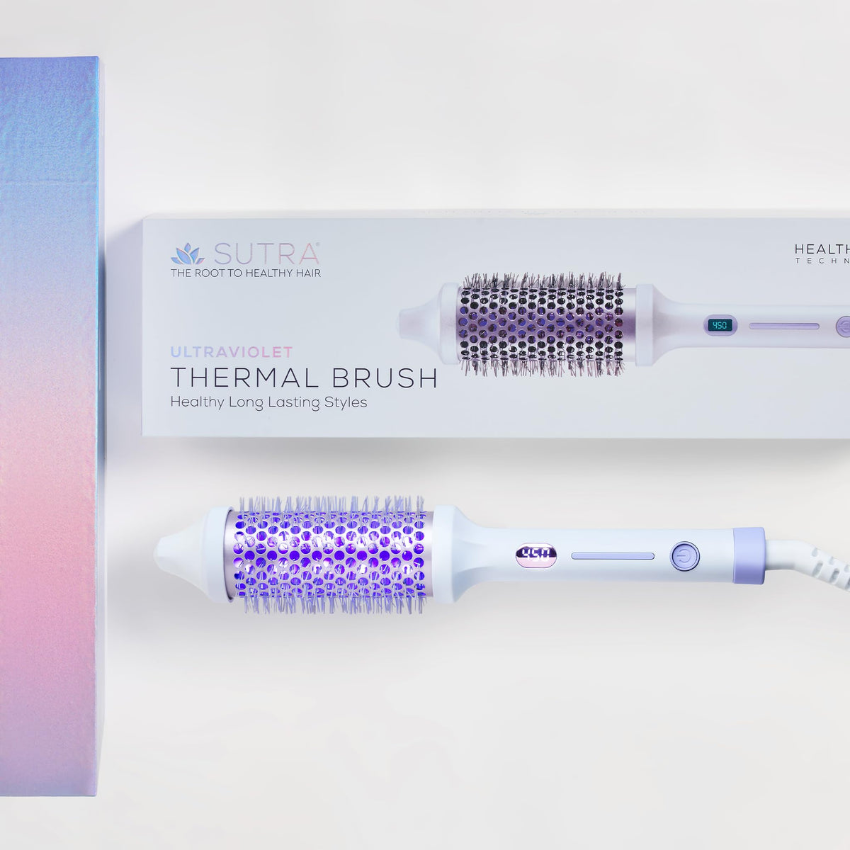 SUTRA Ultra Violet Thermal Brush in use creating sleek, frizz-free shine.