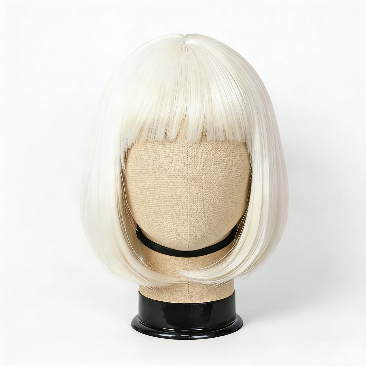 Svolna white blonde short bob wig with bangs, smooth satin-like fibers for everyday wear.