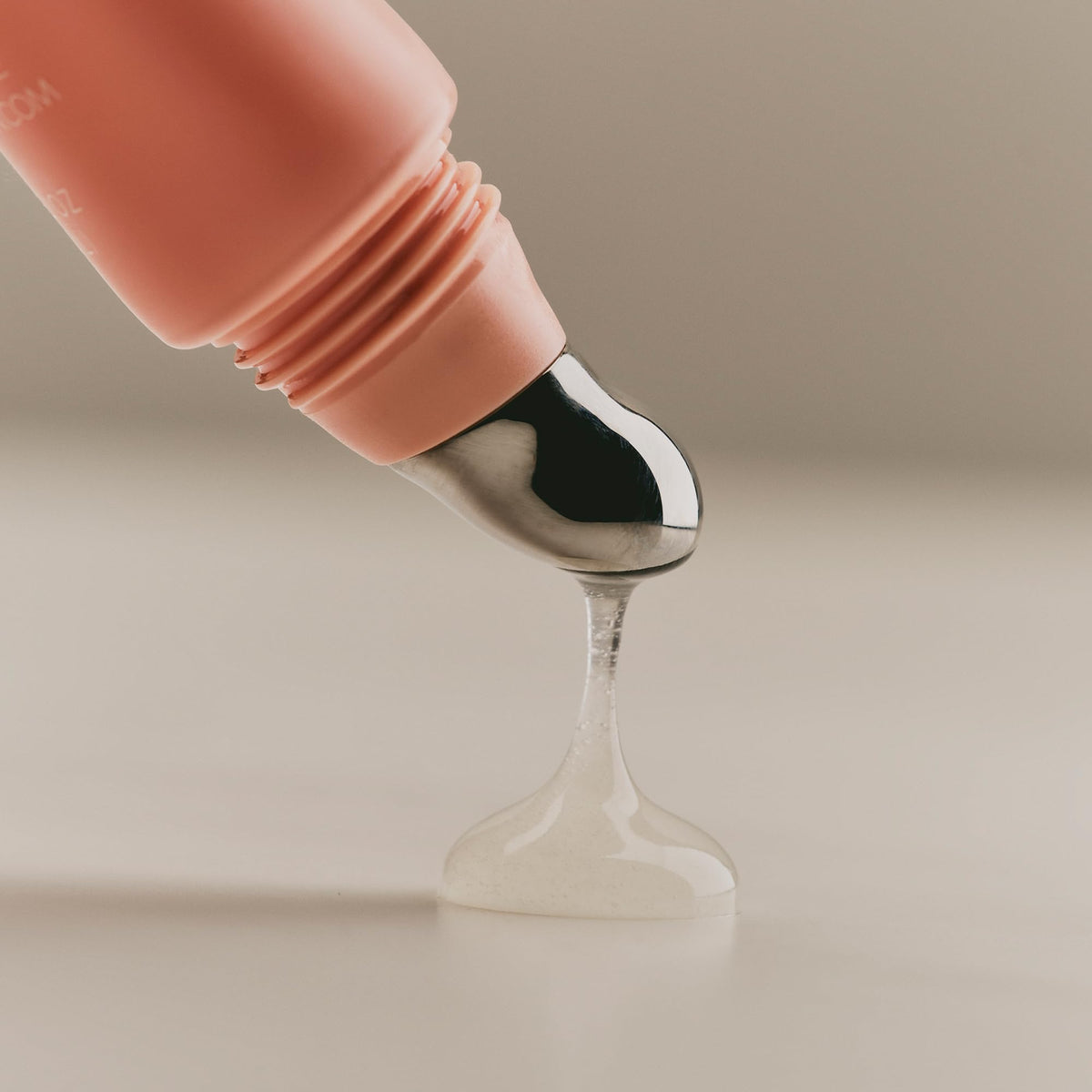 Closeup of SWEET JULY SKIN Lip Treatment cap for easy application.