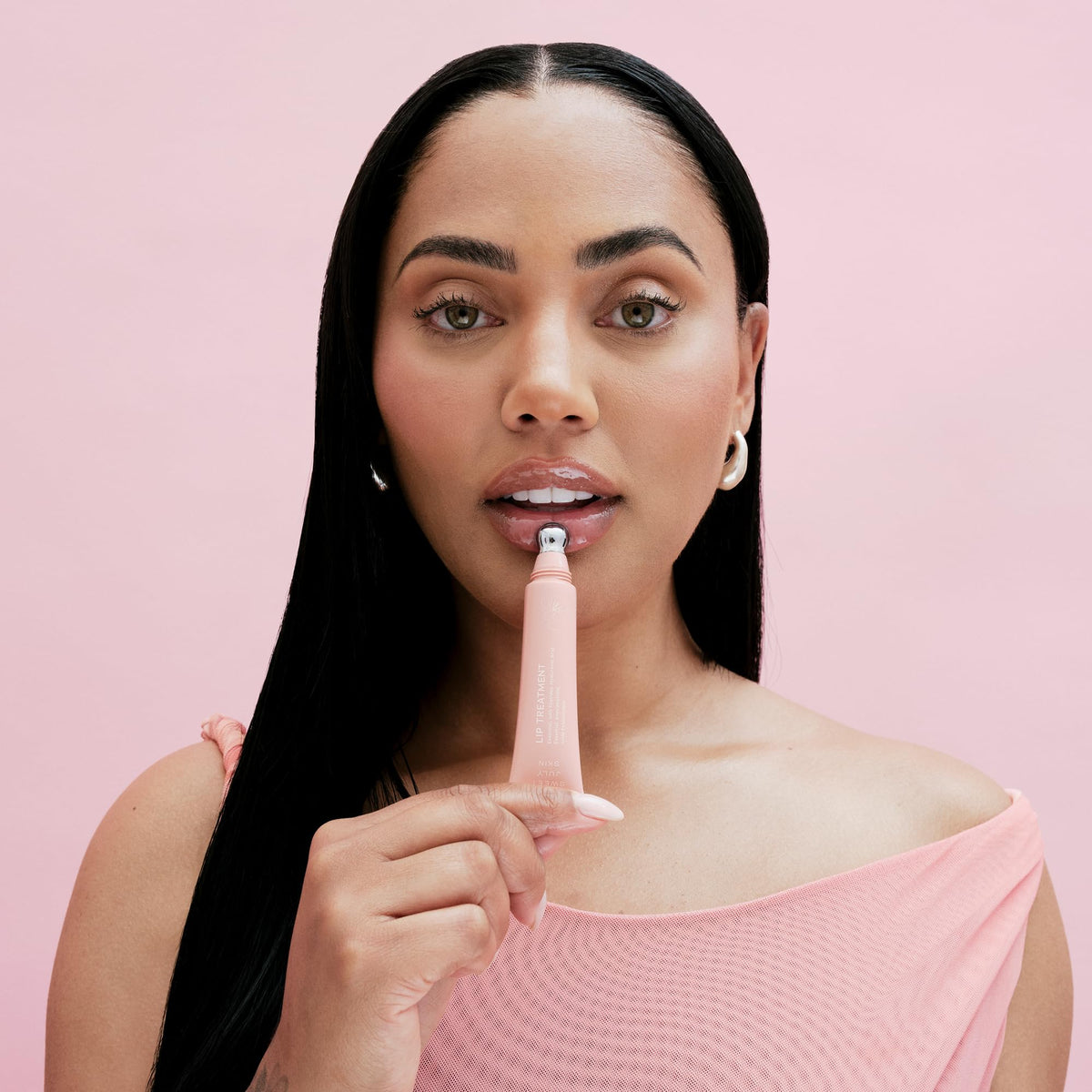 Lip swatch on lips with SWEET JULY SKIN Lip Treatment for natural shine.
