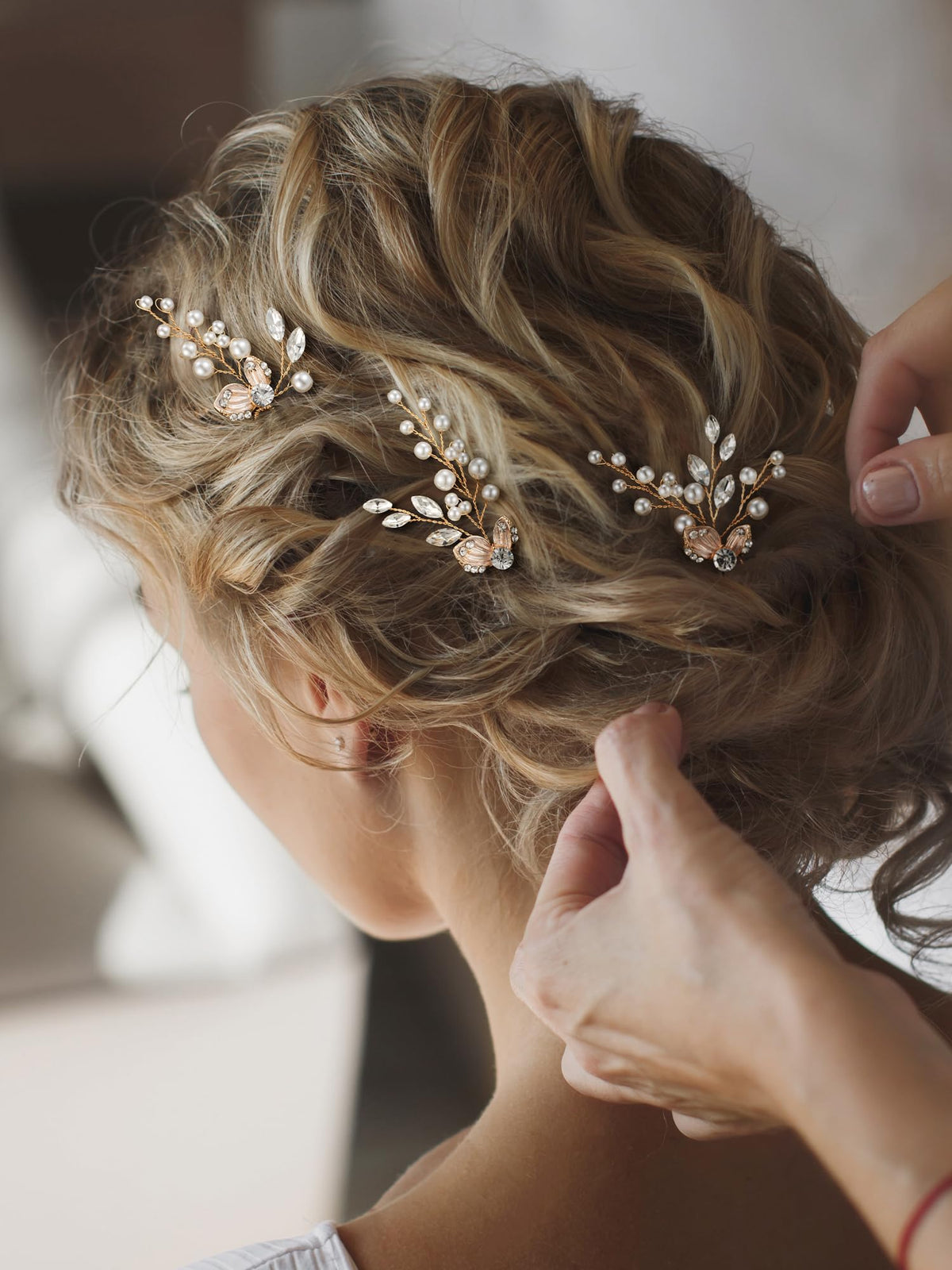 SweetV pearl rhinestone hair pin accent highlights the bridesmaid hairstyle with elegant shine
