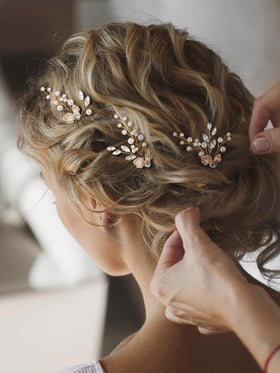 SweetV pearl rhinestone hair pin accent highlights the bridesmaid hairstyle with elegant shine