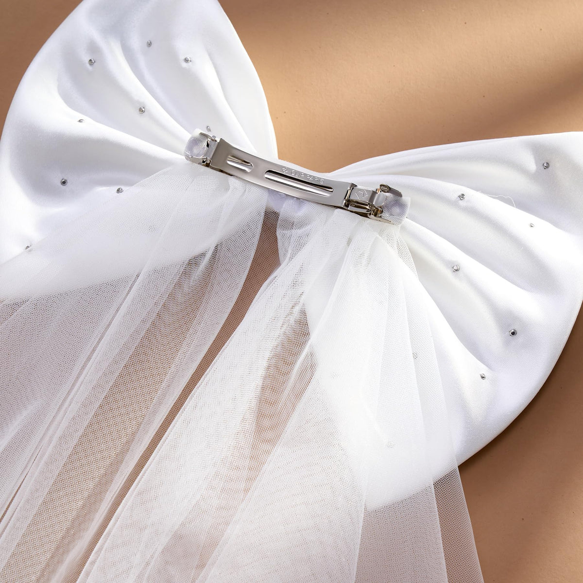 SweetV versatile bow for weddings, showers, and pre-wedding celebrations.