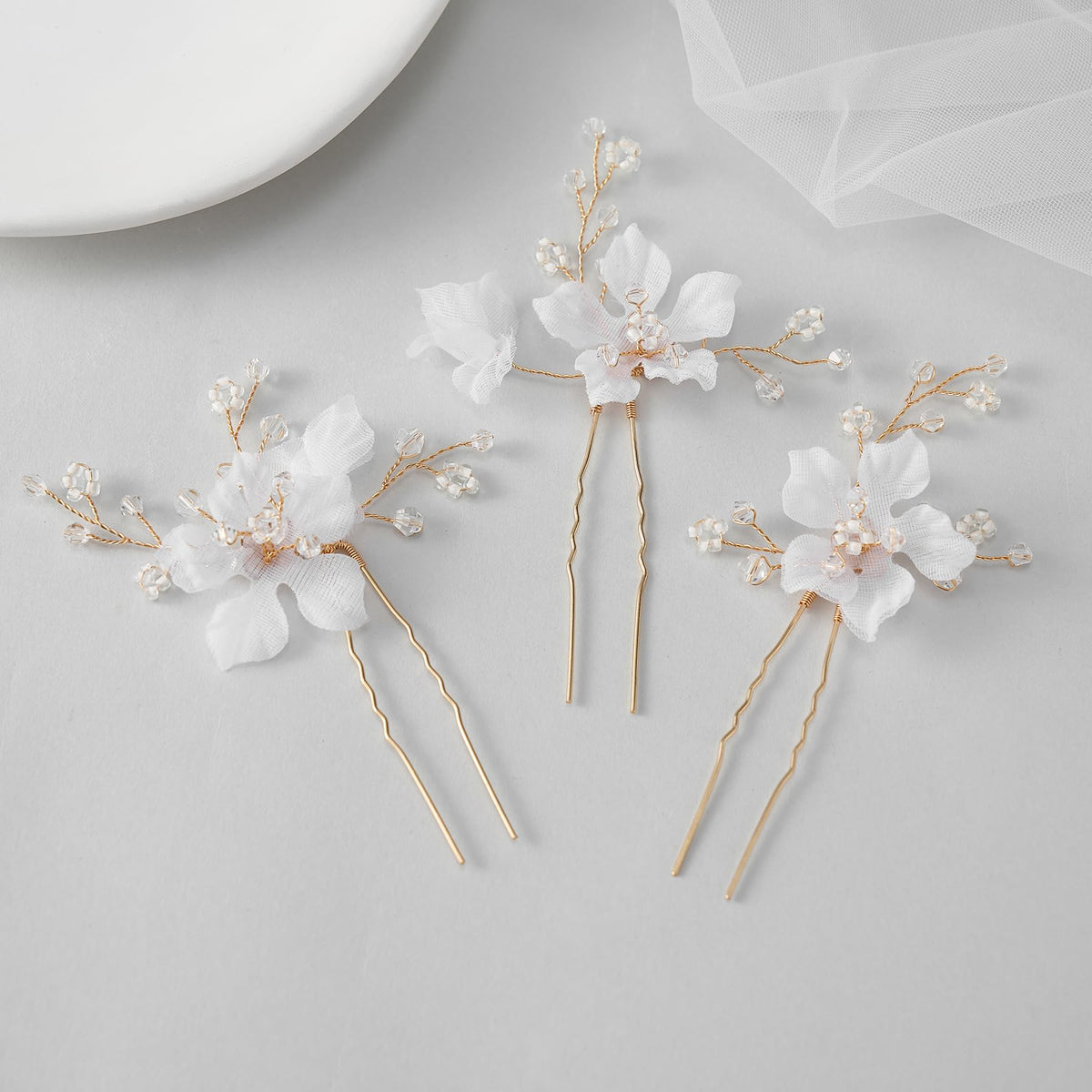 SweetV floral side comb secures hair with delicate decorative touch