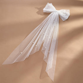 SWEETV classic white bow clip as a timeless bridal accessory.