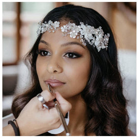 SWEETV crystal flower hairpiece on display for elegant brides.