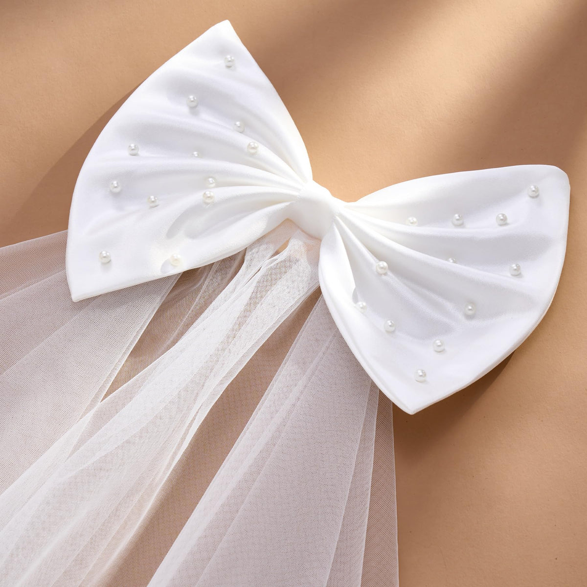 SweetV delicate tulle bow for fluffy texture and soft layering.