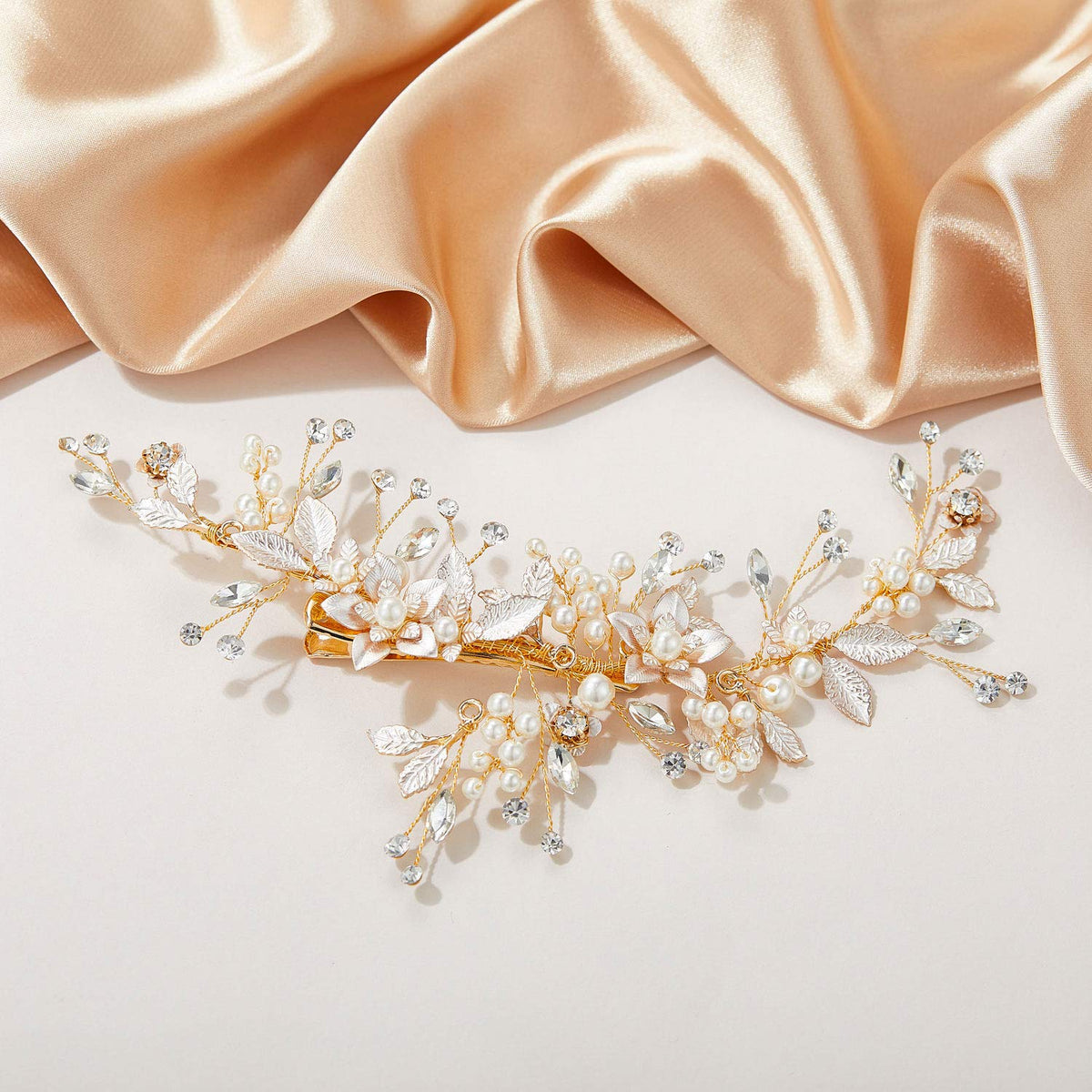 SWEETV Gold wedding hair clip delicate design complements many gowns.