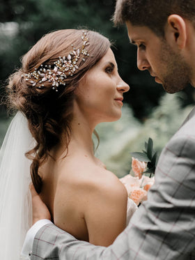 SWEETV Gold wedding hair clip rhinestones catch light for elegance.