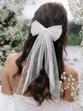 SWEETV pearl-dotted bow with veil suitable for formal wedding looks.