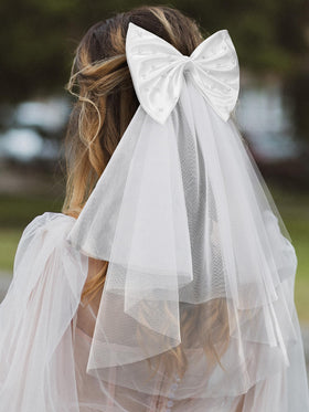 SweetV pearl-embellished bow detail adds a luxurious touch to updos.