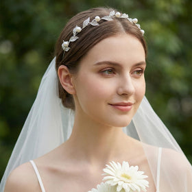 Sweetv silver bridal headband with crystal leaves for a timeless wedding glow.