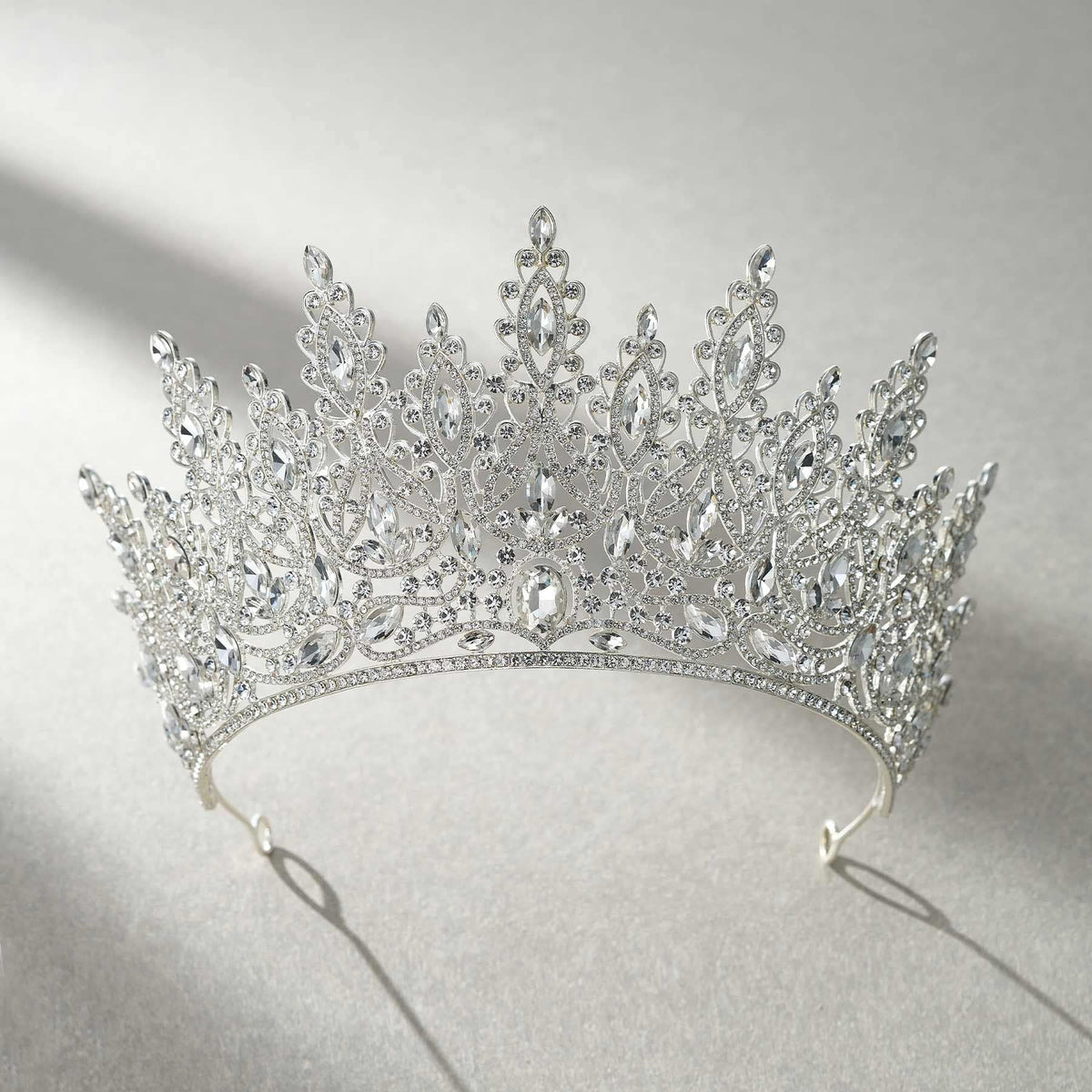 SWEETV Tiara Crown on a wedding hairstyle accentuates the updo