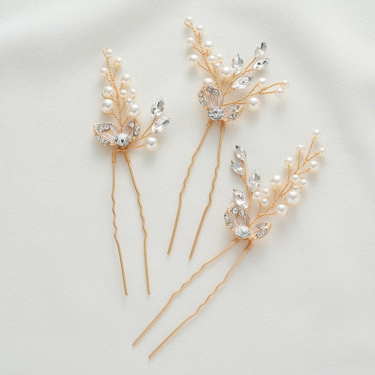 SweetV wedding hair accessories sparkle through pearls and rhinestones on elegant updos