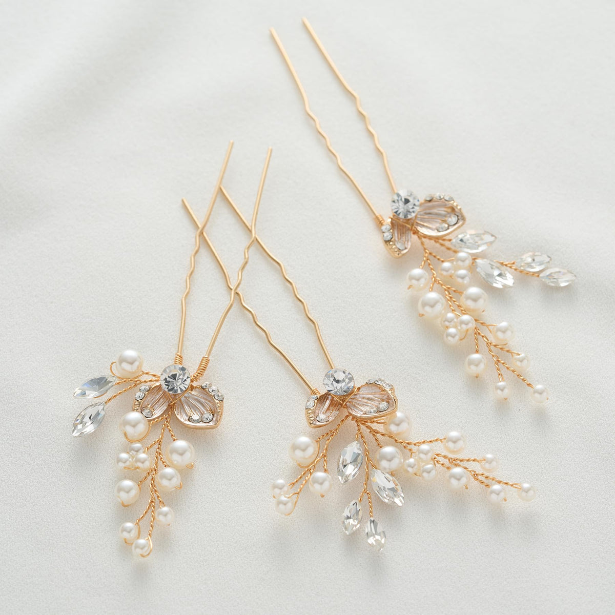 SweetV pearl rhinestone clip complements a honeymoon-ready hairstyle with secure hold