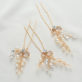 SweetV pearl rhinestone clip complements a honeymoon-ready hairstyle with secure hold