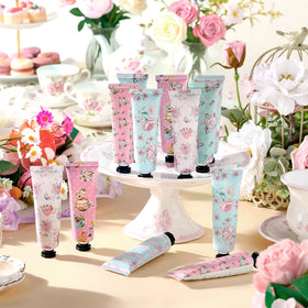 Swiffen teapot favor box display highlights vintage-inspired packaging for tea party celebrations.