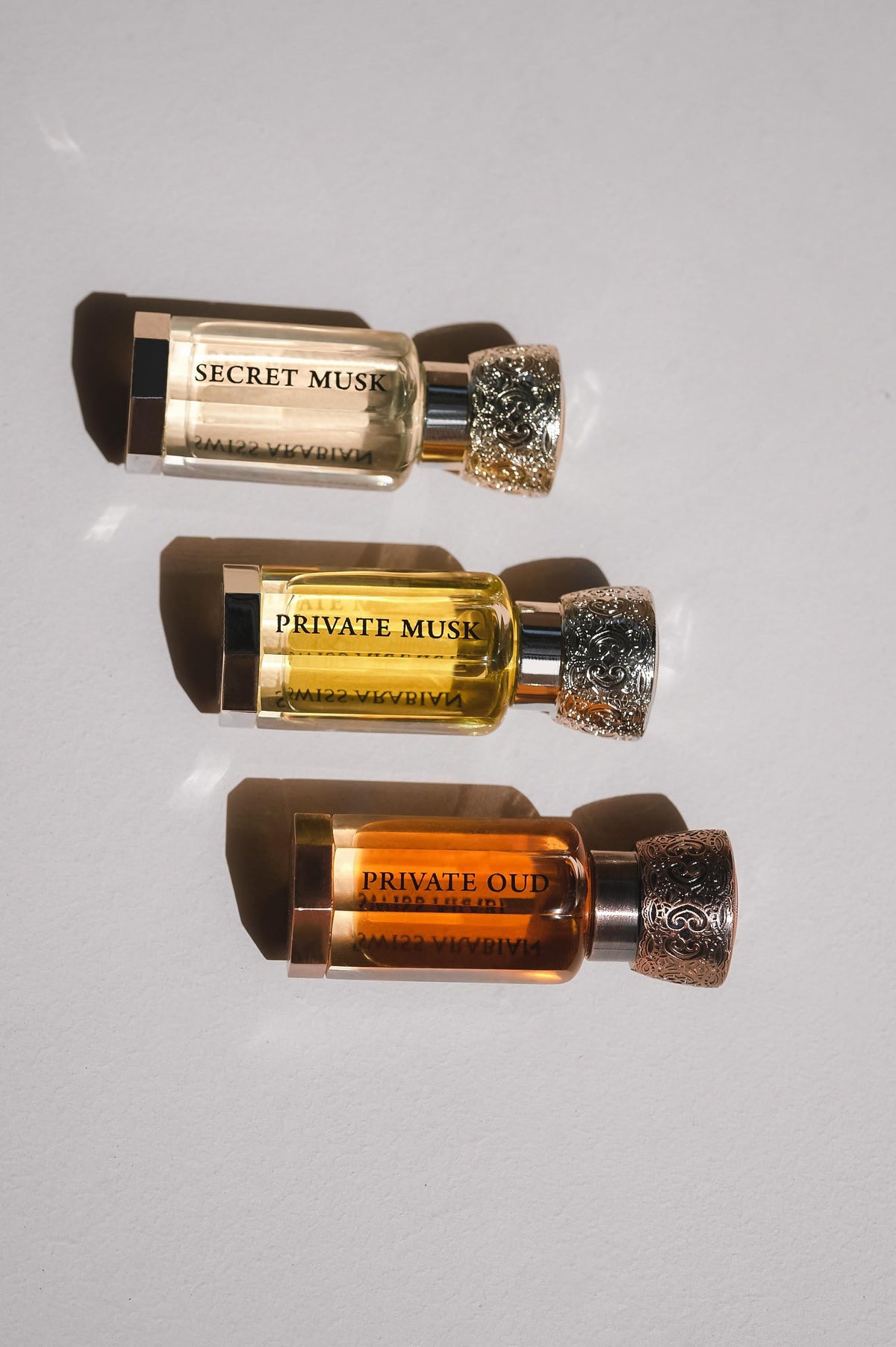 Swiss Arabian Private Musk amber hue image highlighting warm inviting fragrance