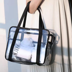 SxoSyo clear makeup bag with two handles for easy carry during travel.