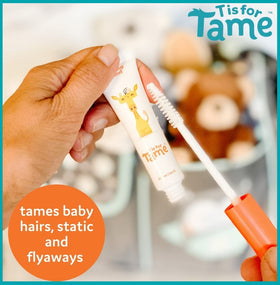 T is for Tame hair-taming-cream-wand-application close-up shows smooth glide.