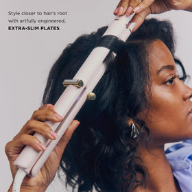 T3 Curling Straightener in luxury vanity setup demonstrating versatile styling.