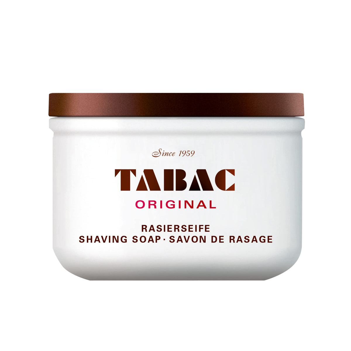 Tabac Original shaving bowl on wooden surface for elegant grooming.