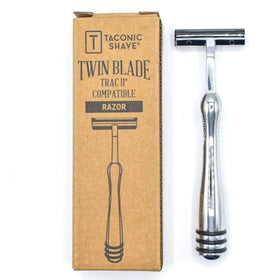 Taconic Shave lubricating strip infused with vitamin E and aloe for smoother glide.
