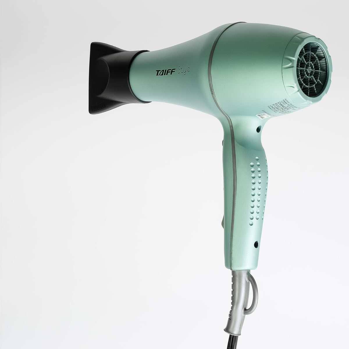 Taiff Style IonSense hair dryer in use for quick, comfortable styling at home.