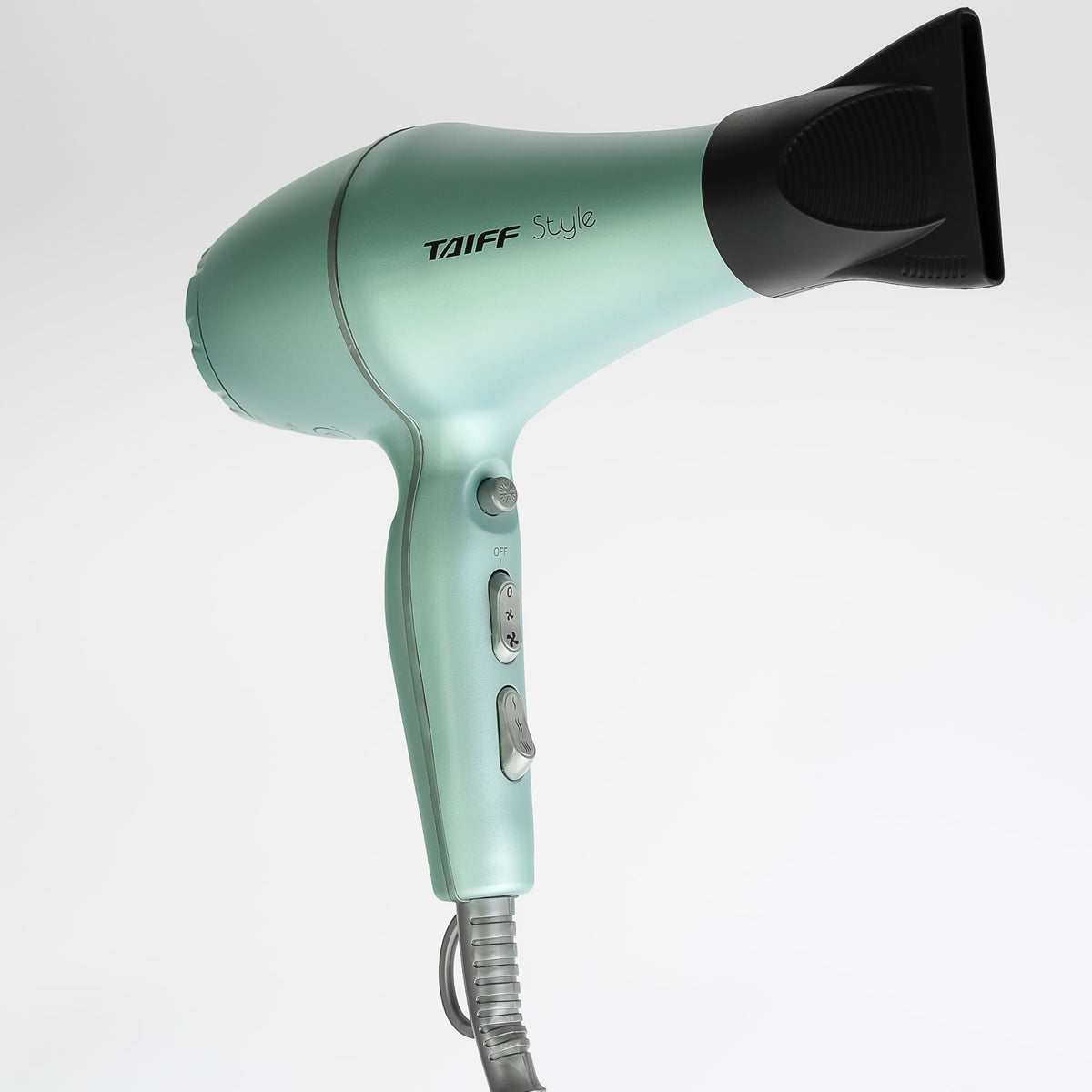 Quiet operation and ergonomic grip on Taiff IonSense dryer for long sessions.