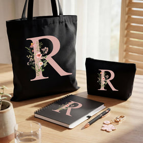 Talltalk shoulder bag monogrammed in black with R motif, ideal for daily carry.