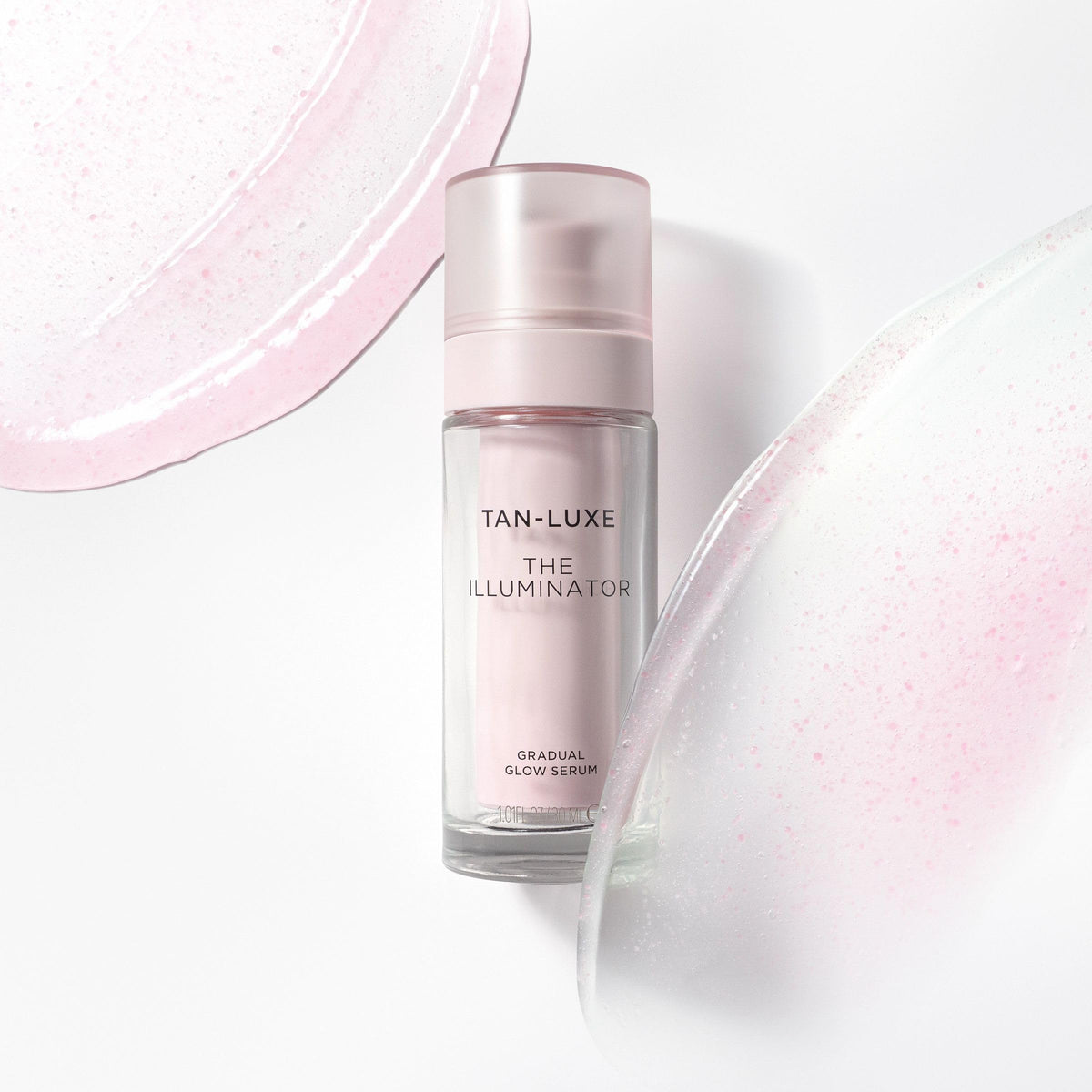 Tan-Luxe Illuminator packaging display emphasizing vegan, cruelty-free skincare.