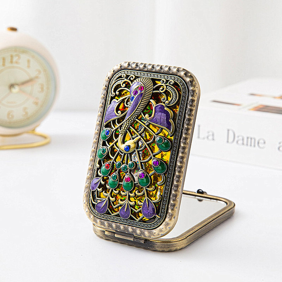 Tang Song pocket mirror with lifelike peacock detail for daily use