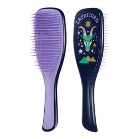 Tangle Teezer Capricorn shower brush for even distribution of conditioning treatments.
