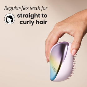 Ergonomic grip of Tangle Teezer Compact Styler for comfortable detangling