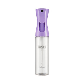 Tangle Teezer Fine Mist Bottle pour shows steady spray for easy detangling.
